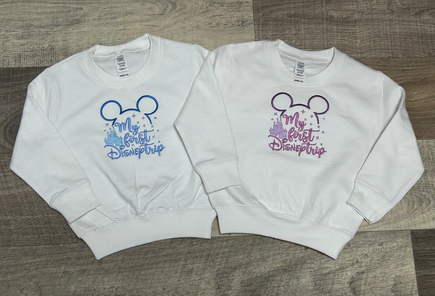 White embroidered first disney trip sweatshirt